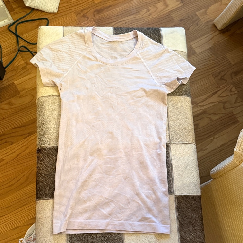 Lululemon swiftly tech short sleeve shirt in pale lavender - hip length.